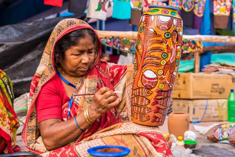 craftswoman-creating-artistic-items-kolkata-india-november-indian-elderly-paints-colorful-handicraft-sale-63073585.webp